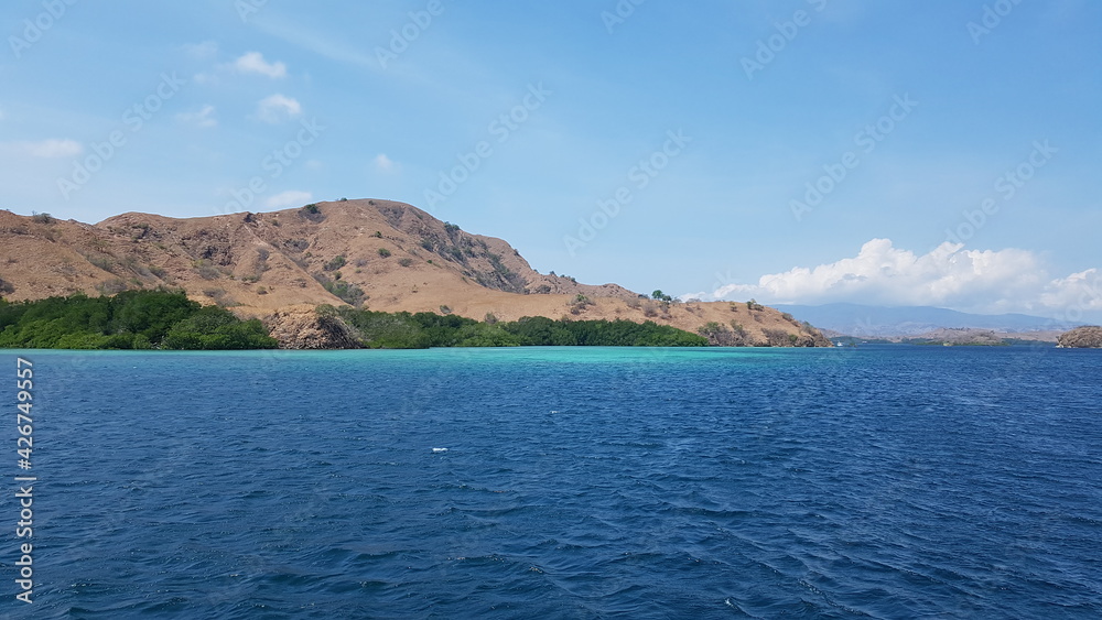 mountains, hills, close to the ocean in labuan bajo