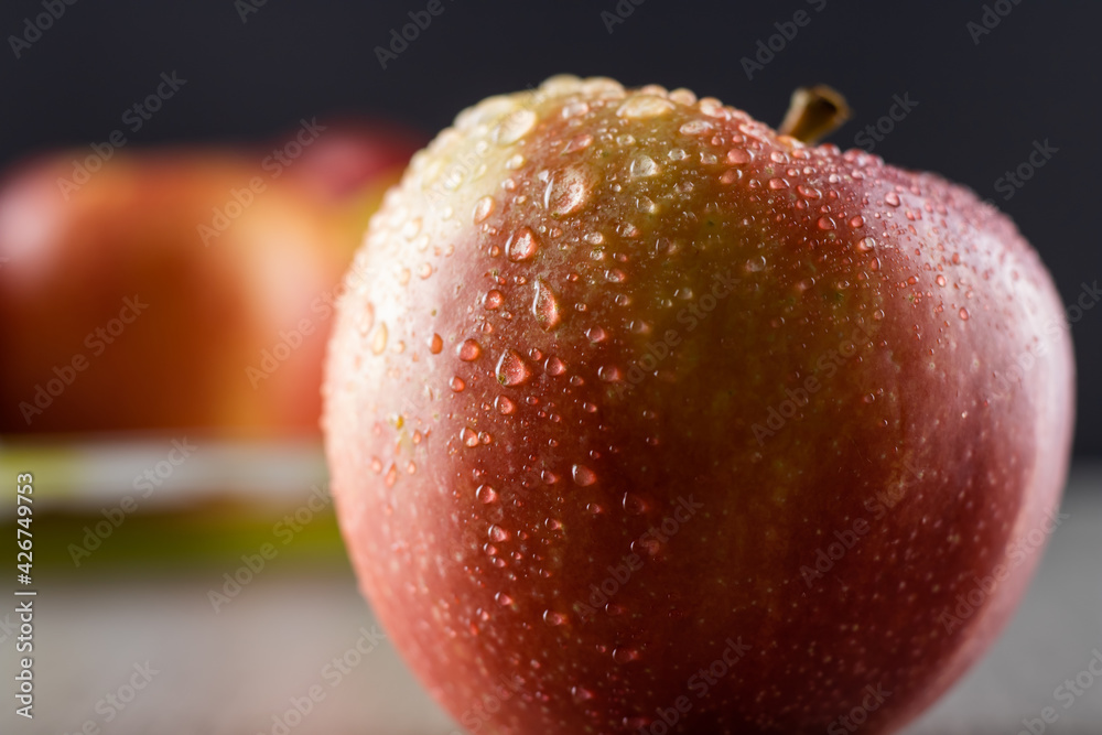 Water drops on a fresh red apple. Close-up. Water drops on a fresh red apple. Close-up.