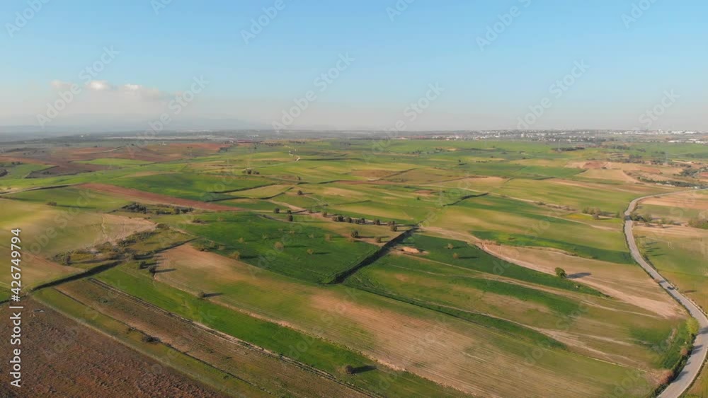 Aerial shot of a farm in a beautiful countryside on a sunny day Aerial shot of a farm in a beautiful countryside on a sunny day