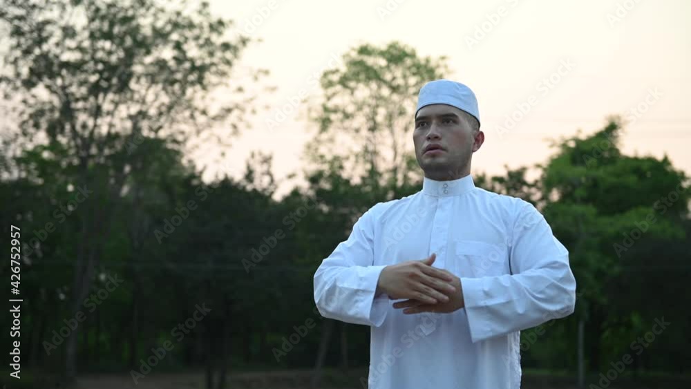 Asian white islam man prayer,Young Muslim praying,Ramadan festival concept Asian white islam man prayer,Young Muslim praying,Ramadan festival concept
