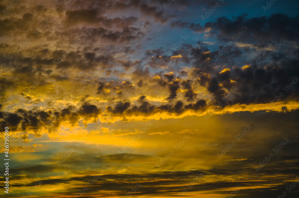 yellow-orange sunset and clouds