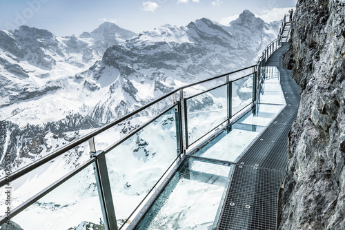 Glass floor on a thrill walk on the top of Birg, Switzerland photo