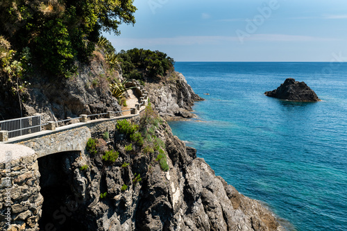 Monterosso, Liguria, Italy, June 2020. La via dell'amore panoramic path that connects the Cinque Terre: an amazing corner of coast with crystal clear waters and wild nature. Beautiful summer day.