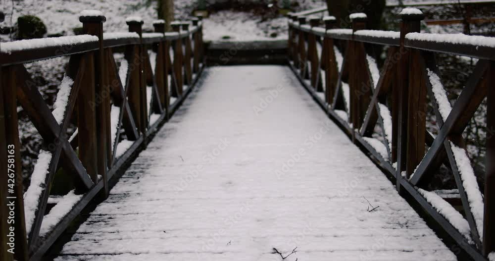 snowy wooden bridge under the magical snow fall snowy wooden bridge under the magical snow fall