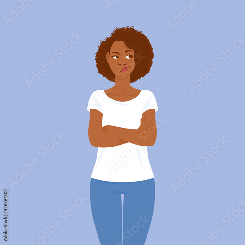 Emotions. Pretty young adult black woman in casual clothes with hair in Afro style.