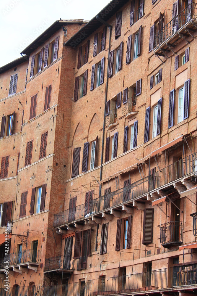 Typical brick houses in Siena, Italy