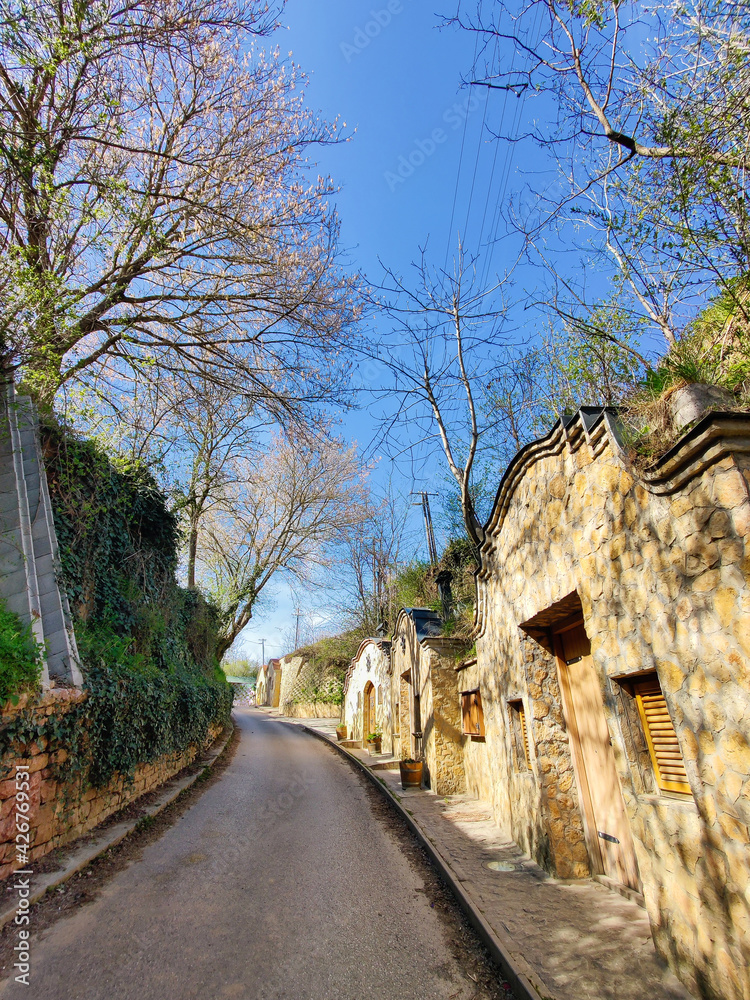 Street between hills with cellars. Street between hills with cellars.