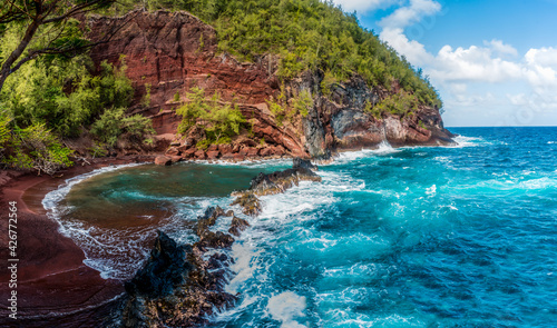 Red Sand And Blue Waves of Kaihalulu Beach, Hana, Maui, Hawaii, USA