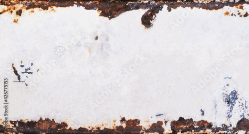 Old metal background with grunge texture and rusted vintage border, white peeling paint and brown grungy rust