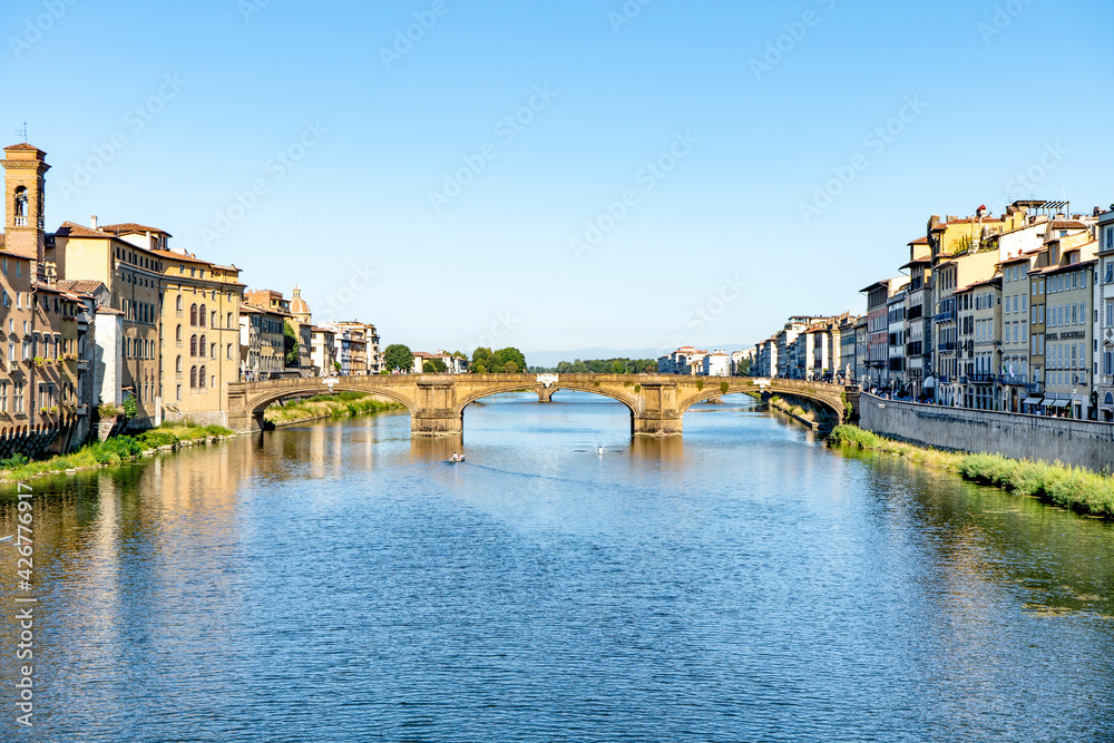 Fototapeta premium The Holy Trinity Bridge (Ponte Santa Trinita), spanning the river Arno, originally built in Renaissance style by Bartolomeo Ammannati in the 16th century, Florence, Tuscany, Italy 
