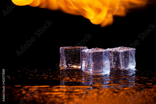 fire and water, flames and ice, black background