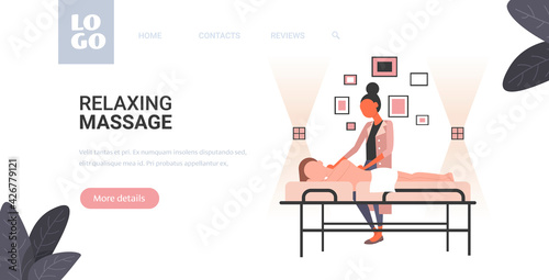 woman receiving body contouring masseuse in spa salon makes anti cellulite relaxing procedures skin care massage therapy concept horizontal full length copy space