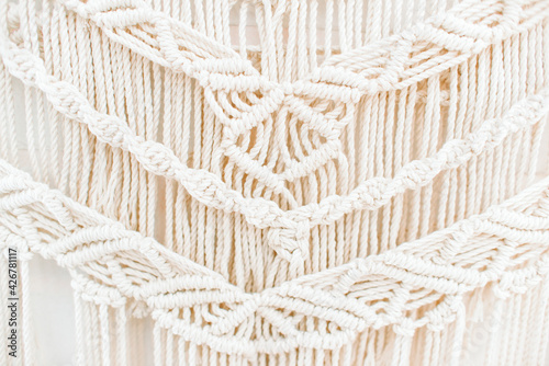 handmade macrame pattern a fragment of a wall panel in the boho style