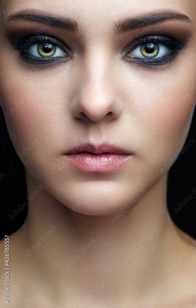 Closeup shot of human female face. Closeup shot of human female face.