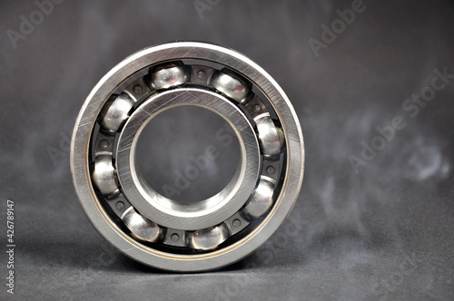 Ball bearing on a dark background. Spare parts.
