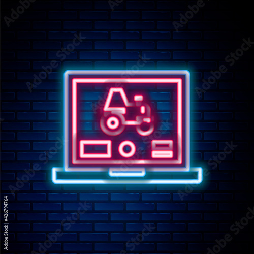 Glowing neon line Laptop application for control a autonomous tractor on a smart farm icon isolated on brick wall background. Smart agriculture implement. Colorful outline concept. Vector