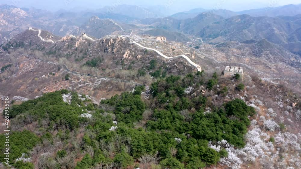 Aerial photograph of the winding ancient Great Wall in spring mountain area of Beijing Aerial photograph of the winding ancient Great Wall in spring mountain area of Beijing