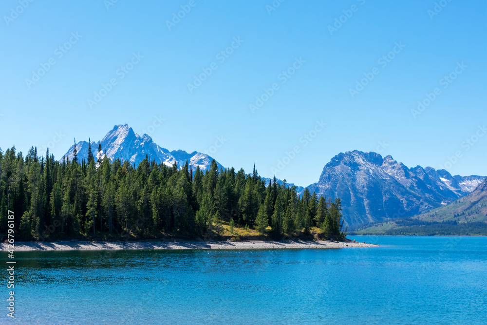 Scenic view of Jackson Lake and Teton Range mountains in Grand Teton National Park,Wyoming, USA. Scenic view of Jackson Lake and Teton Range mountains in Grand Teton National Park,Wyoming, USA.