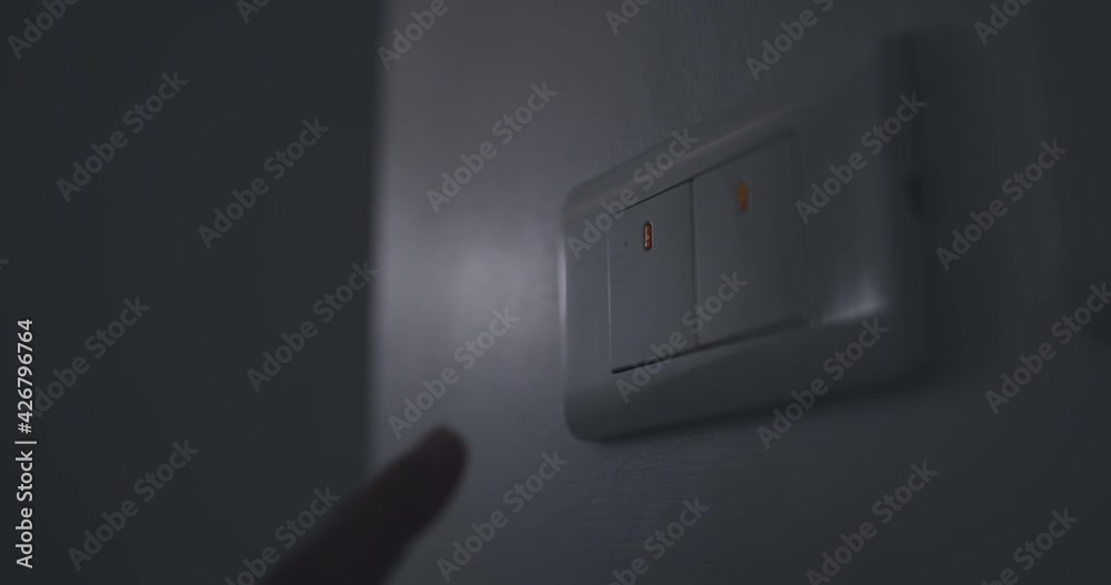 4K Close up slow motion hand push switch on-off electric light. Concept of energy and power saving. 4K Close up slow motion hand push switch on-off electric light. Concept of energy and power saving.