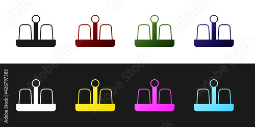 Set Salt and pepper icon isolated on black and white background. Cooking spices. Vector