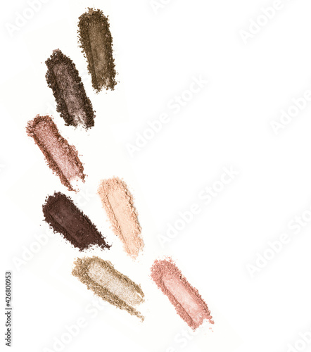 A smashed, neutral toned eyeshadow make up palette isolated on a white background