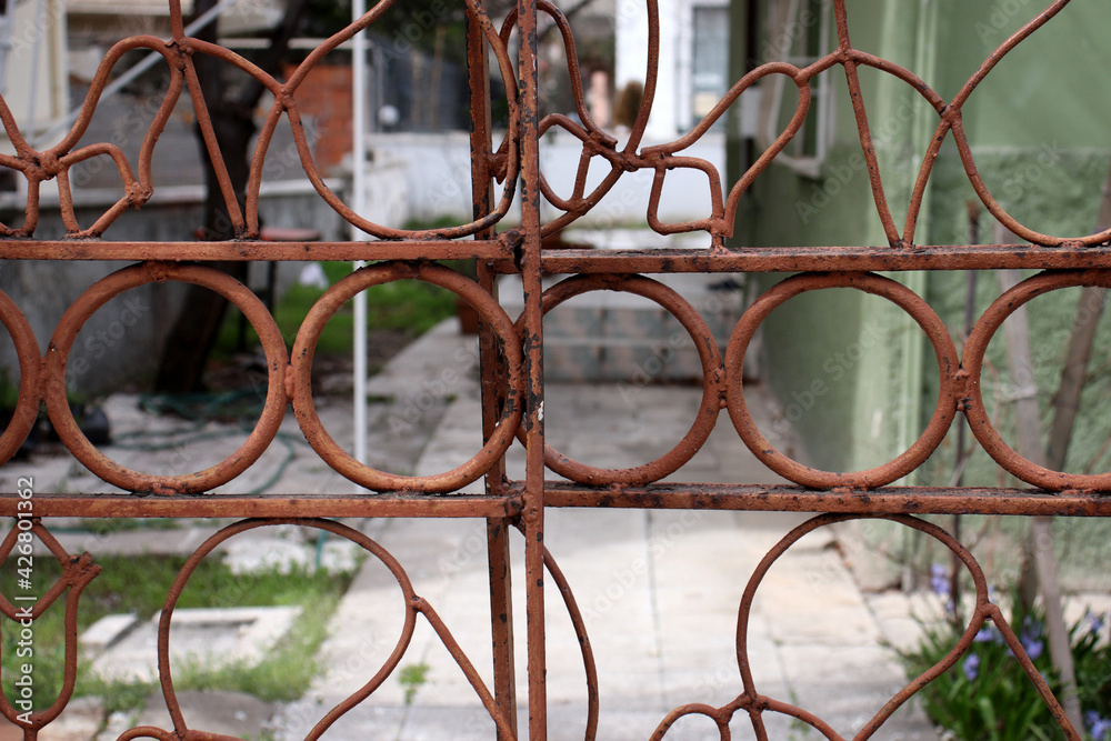old rusty metal fence of a house old rusty metal fence of a house