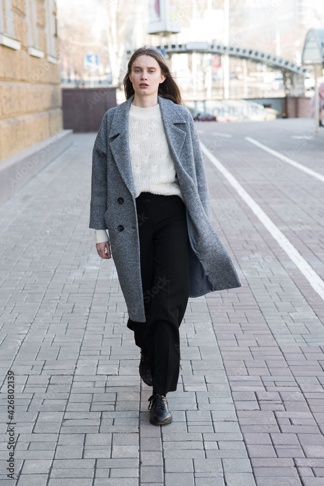 Portrait of an attractive girl on the street while walking Portrait of an attractive girl on the street while walking