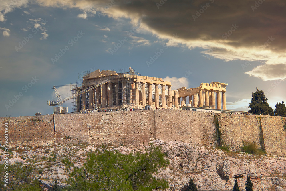 Athens Greece, Parthenon old temple on Acropolis hill under dramatic sky scenic view