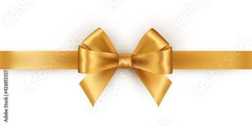 Shiny gold satin ribbon on white background