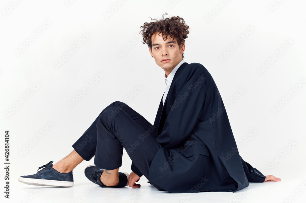 man in black jacket modern style curly hair fun emotions fashion man in black jacket modern style curly hair fun emotions fashion