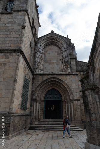 Nossa Senhora da Oliveira church and two pedestrians