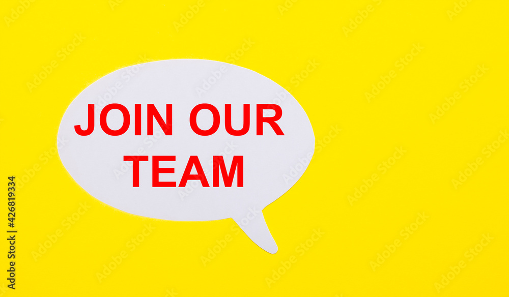 On a bright yellow background, white paper with the words JOIN OUR TEAM On a bright yellow background, white paper with the words JOIN OUR TEAM