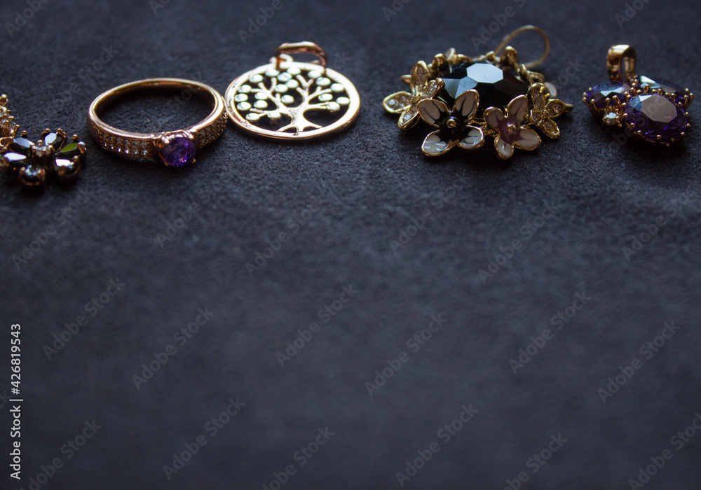 fabric background with jewelry.there is a place for advertising. fabric background with jewelry.there is a place for advertising.