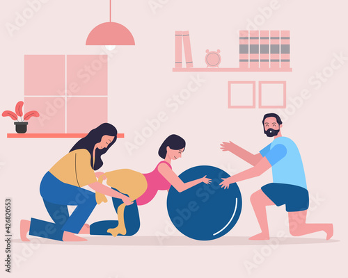 Pregnant woman practicing hypnobirthing with her husband and instructor