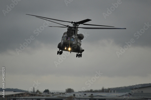 Valokuva Chinook helicopter landing approach head on view with landing lights on against