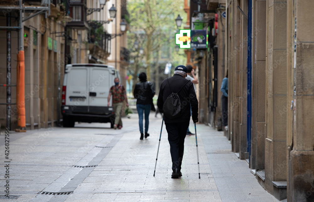 man walking down the street