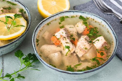 Fish in aspic with vegetables. Fish in jelly. Fish with gelatin. photo