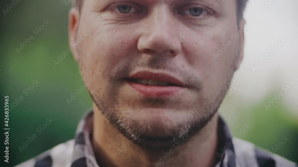 Unshaven man chewing gum. Close-up. Unshaven man chewing gum. Close-up.