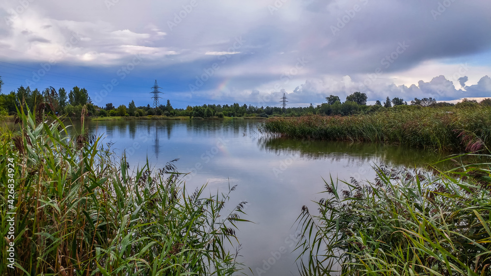 Landscape with a view of the lake and a beautiful sky with clouds above it