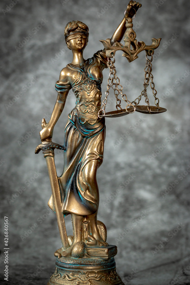 The statue of justice - lady justice or iustitia - justitia the roman goddess