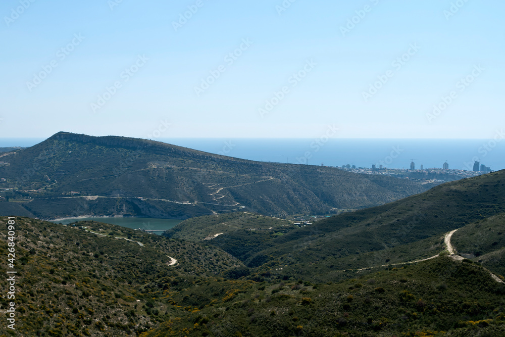 Scenic view of green mountains, Germasogeia water reservoir, Mediterranean sea and Limassol city, Cyprus Scenic view of green mountains, Germasogeia water reservoir, Mediterranean sea and Limassol city, Cyprus
