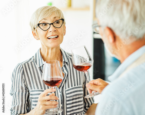 love kitchen senior glass woman couple home retirement happy food smiling husband wine together portrait