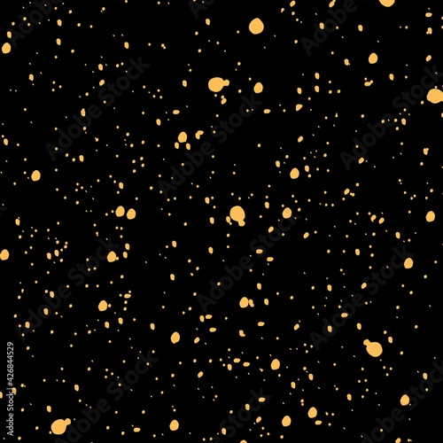 Falling golden dots on black background abstract decoration for party 