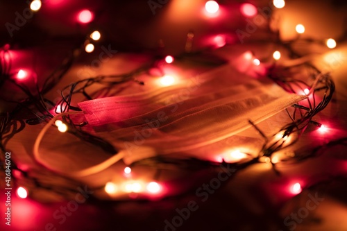 tree lights wrapped around red and white