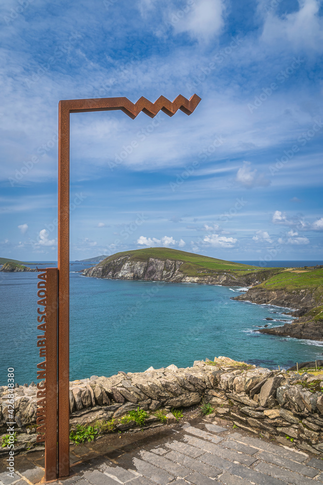 Sign Radharc na mBlascaoidi means in Irish Blasket Island Viewpoint with scenic Dunmore Head in Dingle Peninsula, Wild Atlantic Way, Kerry, Ireland