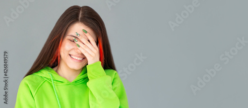Bilde på lerret laughing woman embarrassed with her silliness covering with hand