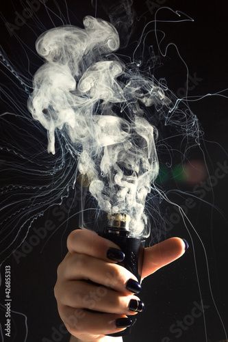 woman holding a mod vape explosion