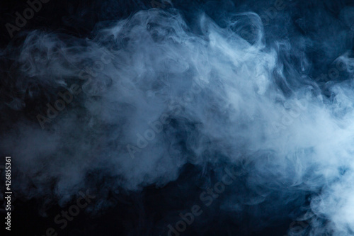 Cloud of vapor. Dark blue background © Oleksandr