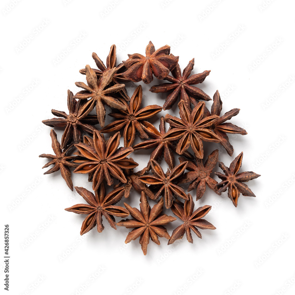 Star Anise – Heap of Chinese Star Aniseed, Aromatic Ingredient – Top View, Close-Up Macro, from Above – Isolated on White Background Star Anise – Heap of Chinese Star Aniseed, Aromatic Ingredient – Top View, Close-Up Macro, from Above – Isolated on White Background