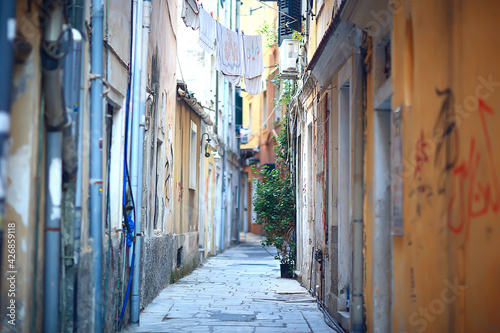 linen is dried in a narrow street of Italy, Italian lifestyle © kichigin19